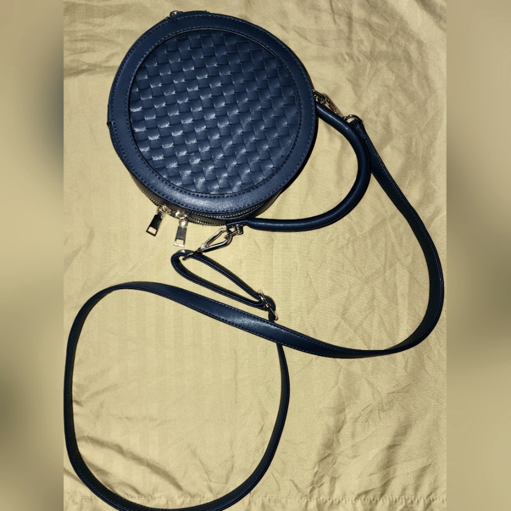 Basket Weave Double Zipper Circle Bag in Navy Blue with Gold Accents.